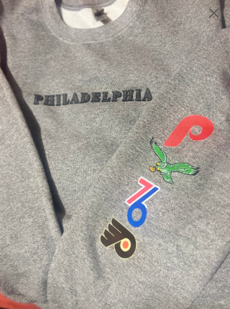 Philadelphia Vintage Sports with team logos on arms